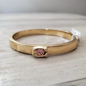 Coach Bangle Bracelet with pink stone gold tone